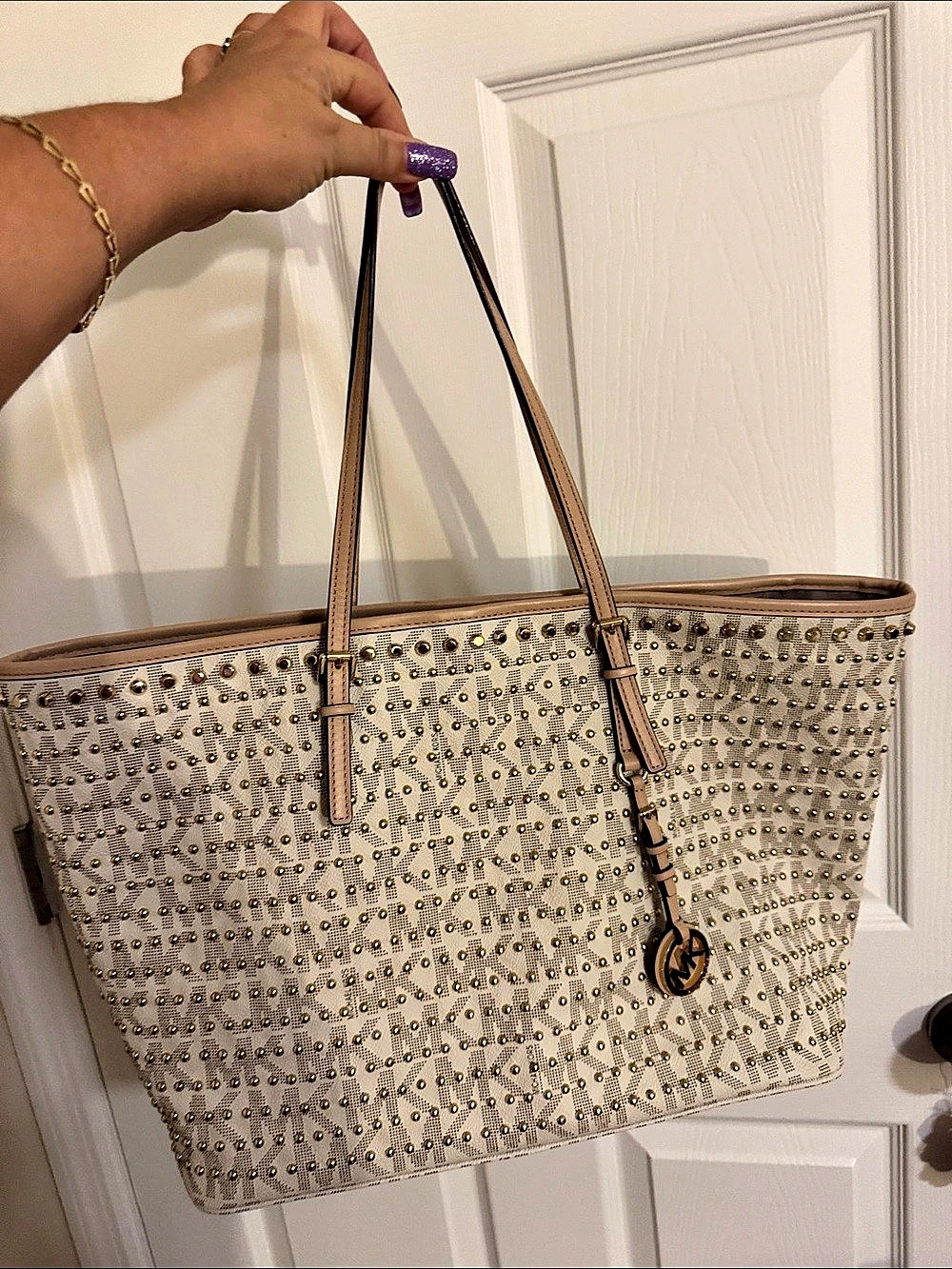 Michael Kors Limited Edition
Studded Jet Set Tote Bag with Gold stud
Accents